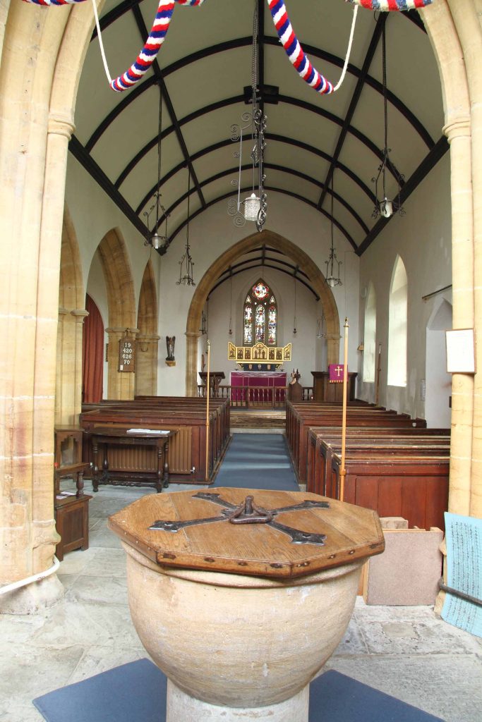 Interior view of the church looking from the font towards the altar.